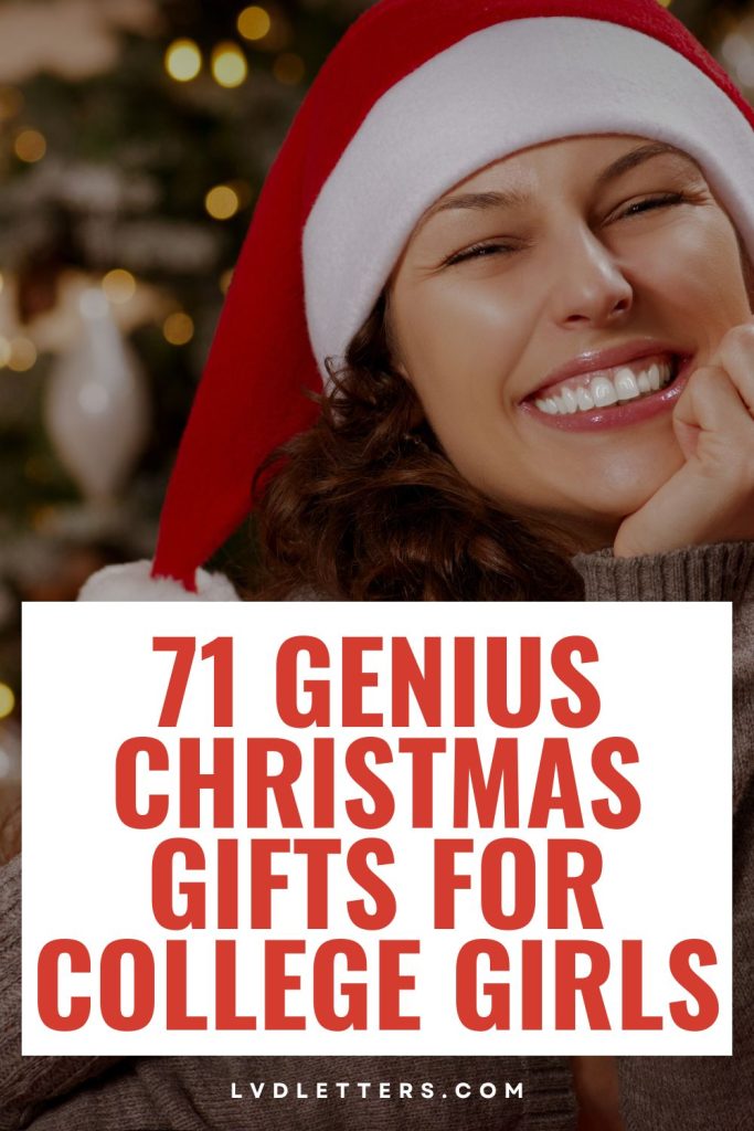 71 genius christmas gifts for college girls - picture of college girl in santa hat smiling in front of christmas tree