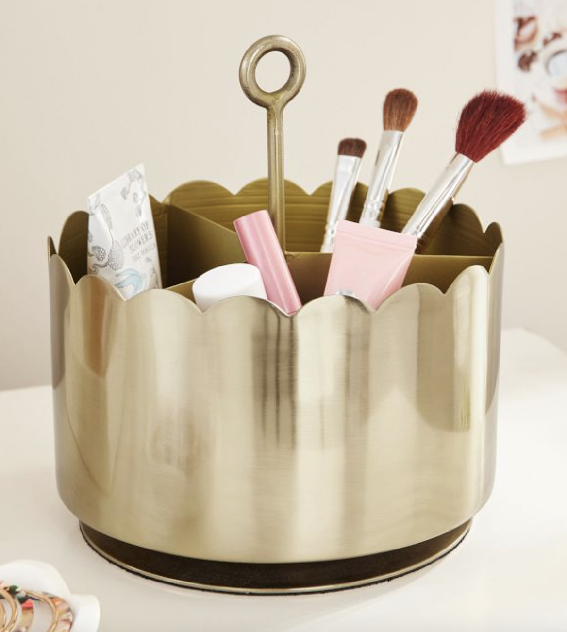 28. Rotating gold organizer