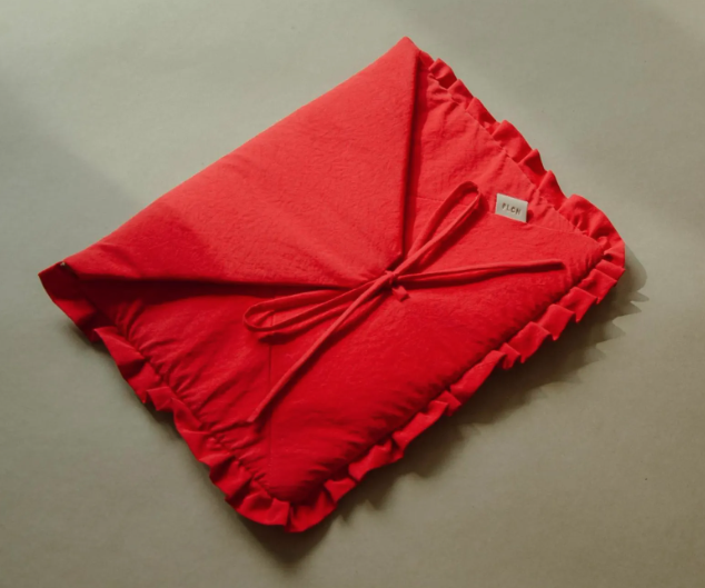 Red quilted laptop sleeve