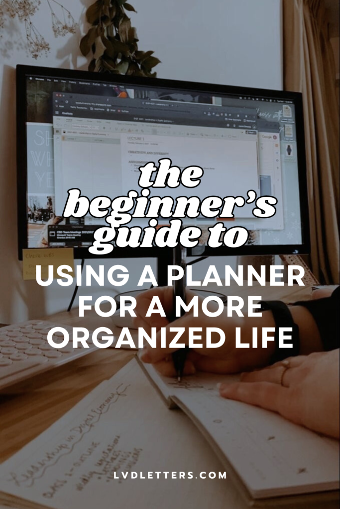 the beginner's guide to using a planner for a more organized life - text over picture of woman's desk with monitor and planner open in front of her